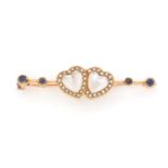 An Edwardian moonstone, seed pearl and sapphire brooch,