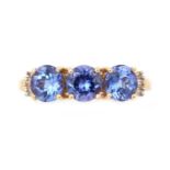 A tanzanite and diamond ring,