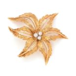 An 18ct yellow gold and diamond brooch,