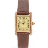 Must de Cartier Vermeil Tank: a silver-gilt cased lady's wristwatch,