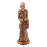 A carved wood, polychrome and gilt sculpture of St Peter,