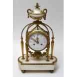 Vincenti & Cie, France: a white stone and gilt metal mantel clock,