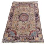 A Kirman carpet,