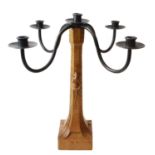 An oak and wrought iron candelabra by Robert 'Mouseman' Thompson