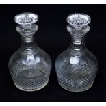 pair of early 19th Century cut glass decanters