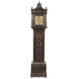 Ion (Jon) Ellis of Sherbourne: an ebonised and carved oak longcase clock