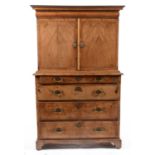 An 18th Century walnut cabinet on associated chest