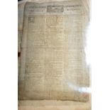A collection of antique and vintage newspapers.
