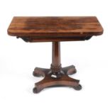 A Victorian rosewood card table