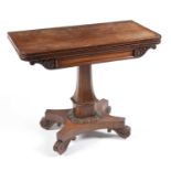 A Victorian mahogany tea table