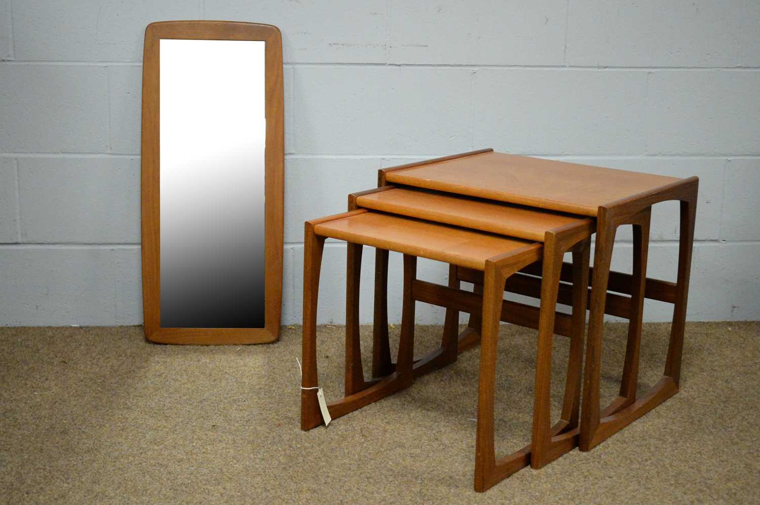 A G-Plan 'quadrille' nest of tables; and a wall mirror