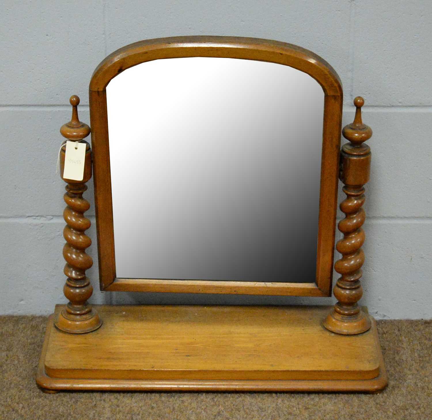 A Victorian swing-framed toilet mirror