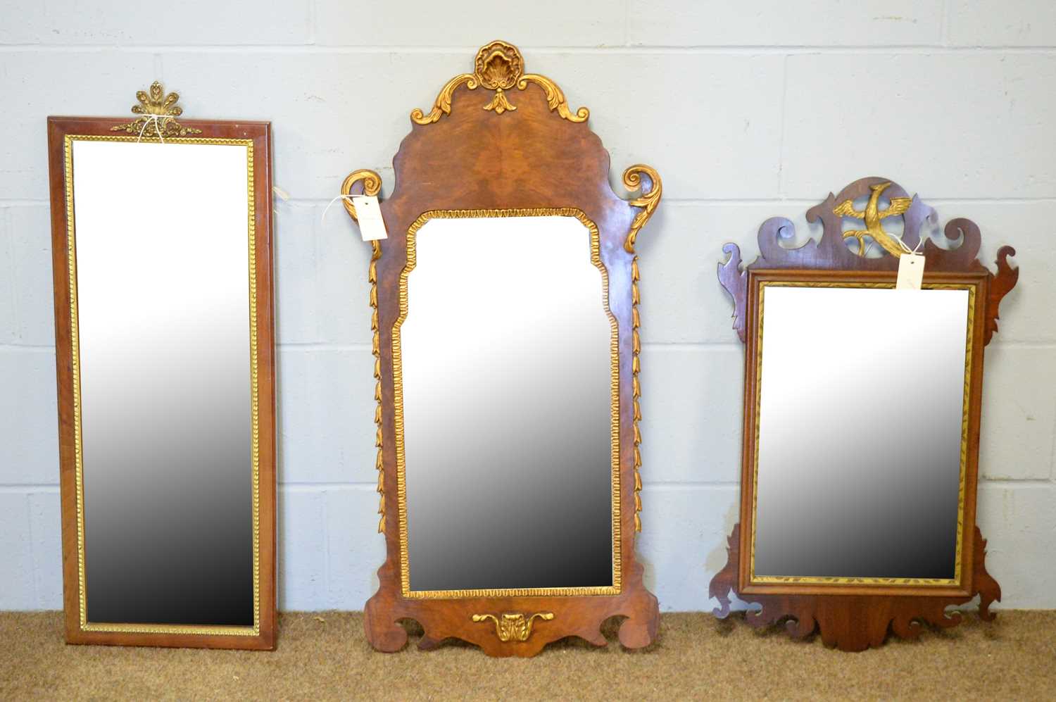 Three decorative wall mirrors