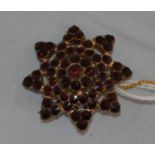 A 19th Century garnet cluster brooch