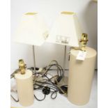 Four table lamps.