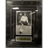 A selection of framed football memorabilia relating to Newcastle United F.C.