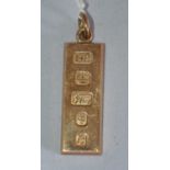 A 9ct yellow gold ingot pendant,