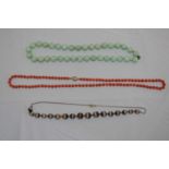 Three bead necklaces.