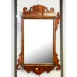 A Georgian-style wall mirror