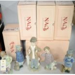 Selection of five Nao ceramic figures of boys.
