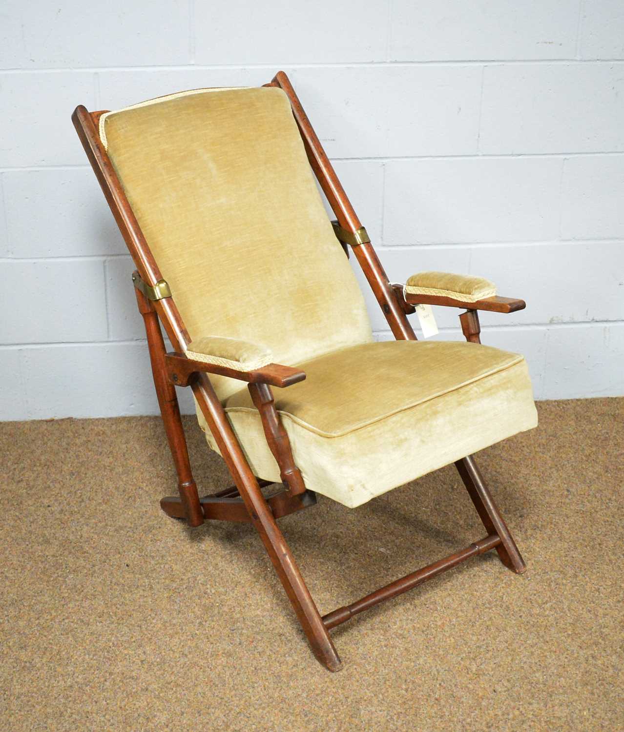 A late 19th Century mahogany adjustable armchair