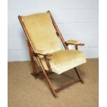 A late 19th Century mahogany adjustable armchair