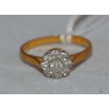 A diamond cluster ring,