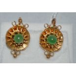 A green stone gold earrings