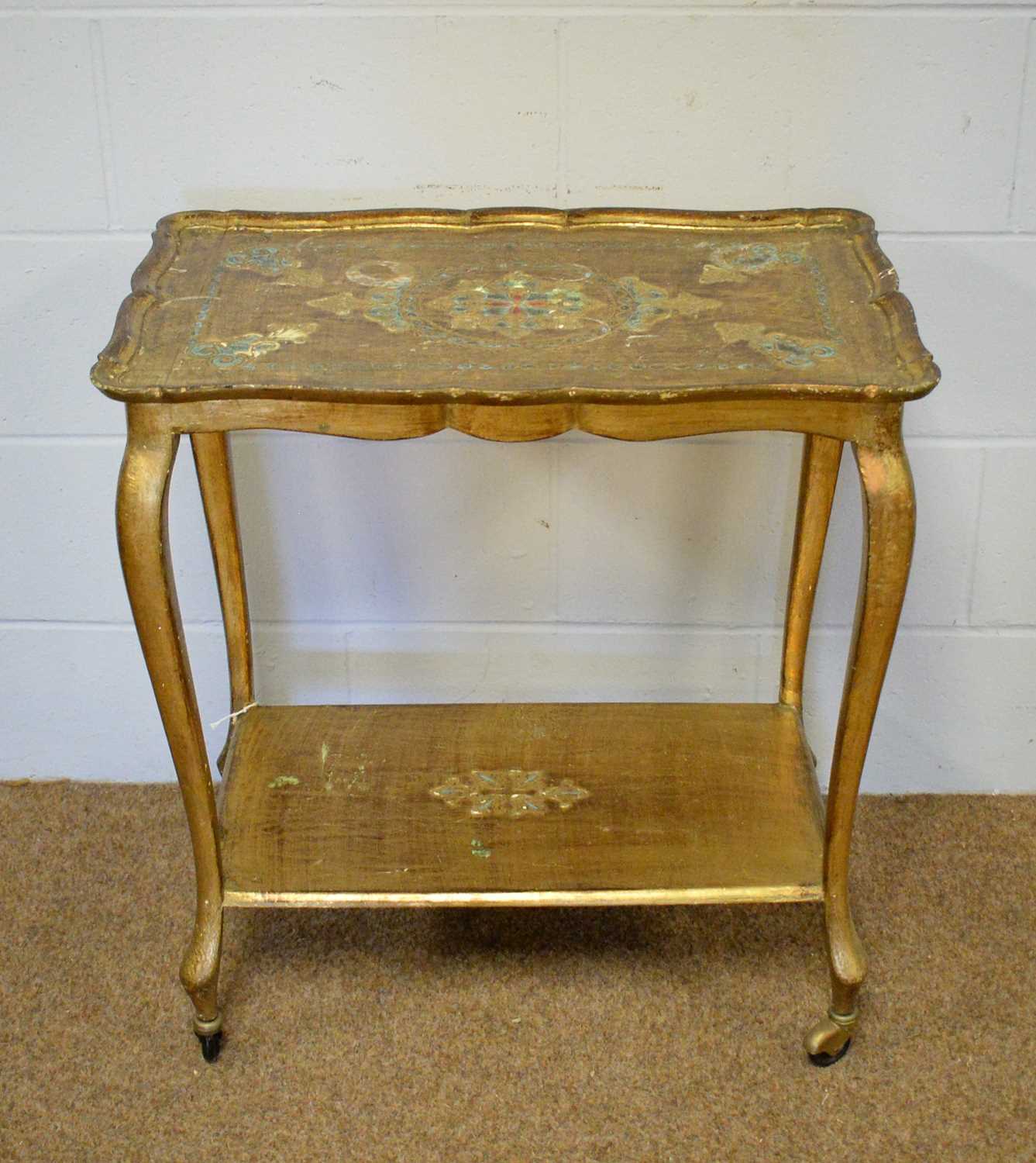 A decorative two-tier table trolley