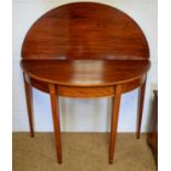 A Georgian inlaid mahogany demi-lune tea table