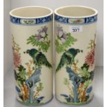 A pair of Oriental sleeve vases.