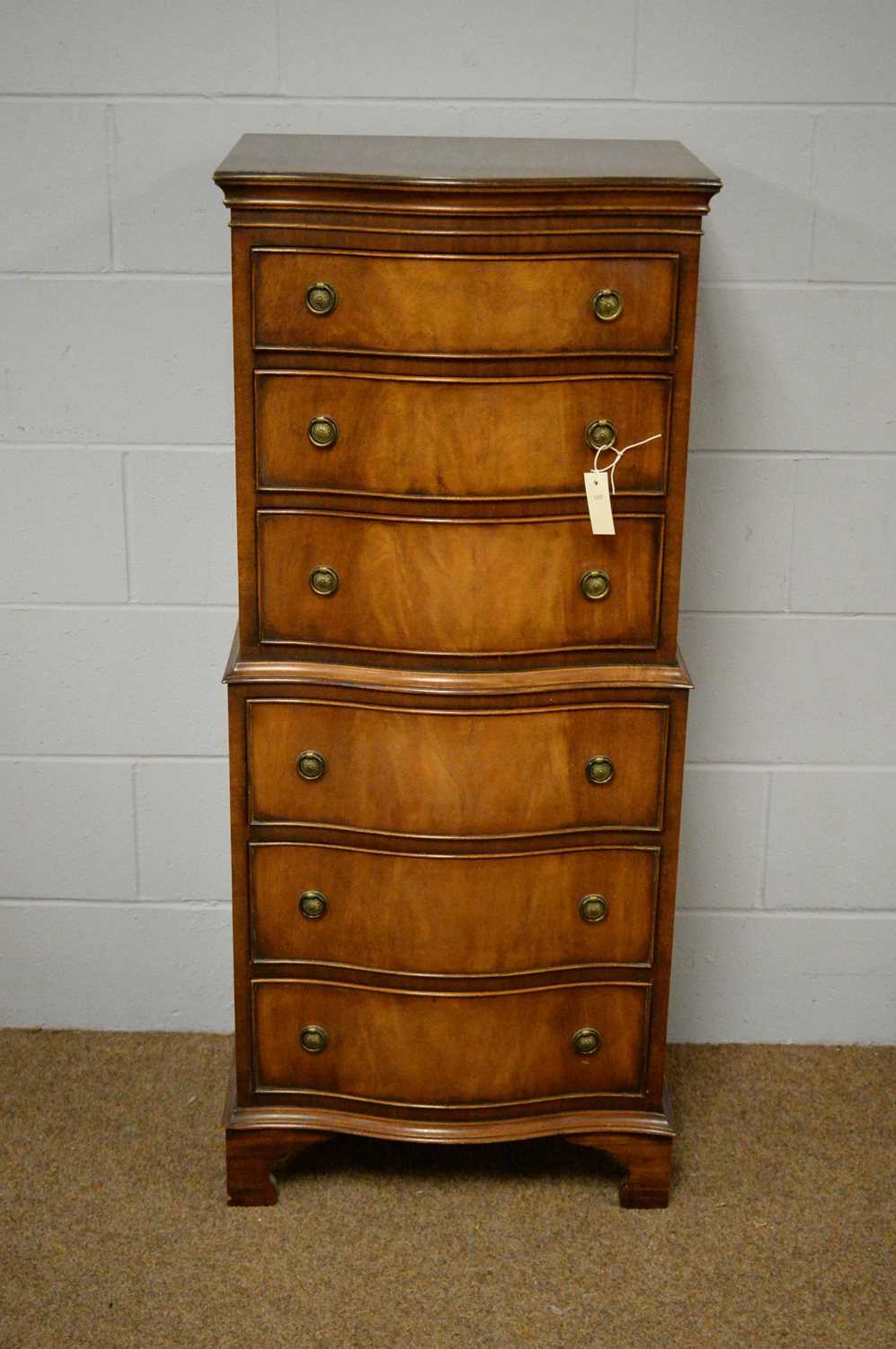 A reproduction Georgian-style chest-on-chest