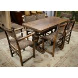 A mid/late 20th Century dining table and six chairs
