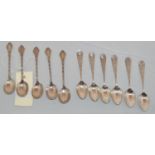 Sets of six and five silver spoons