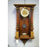 A late 19th Century Vienna-style wall clock
