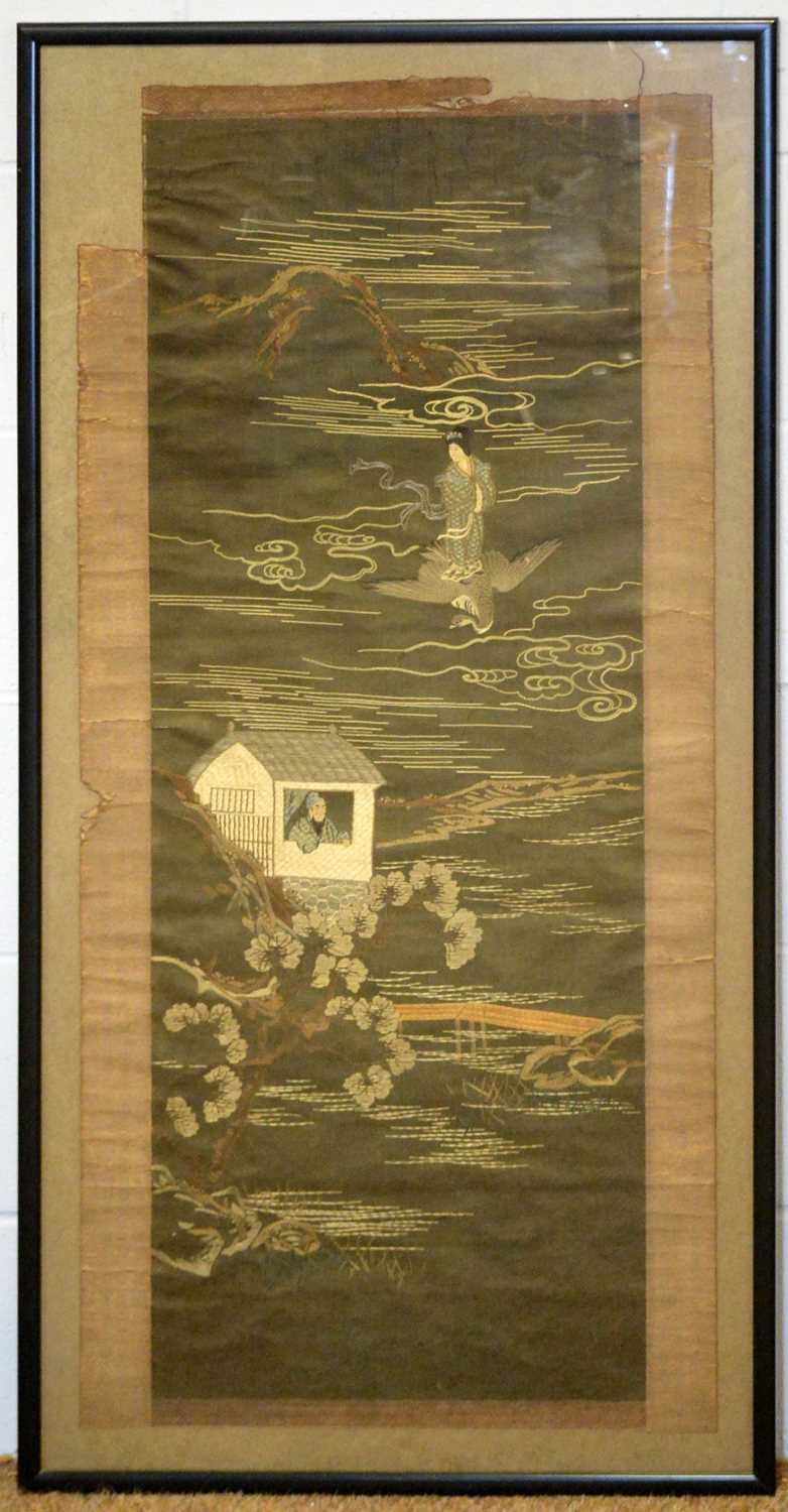 An antique Chinese wall hanging.