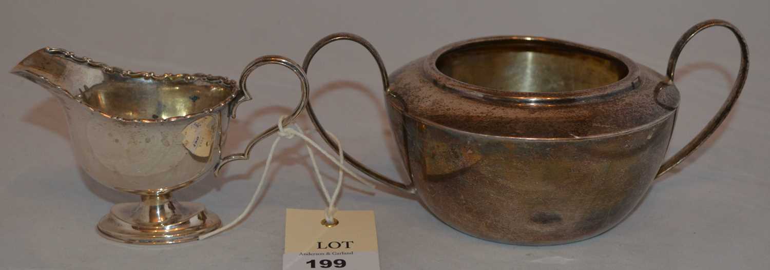 Silver sugar bowl and cream jug.