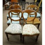 A matched harlequin set of four Victorian balloon back dining chairs and three others.