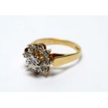 A diamond cluster ring,