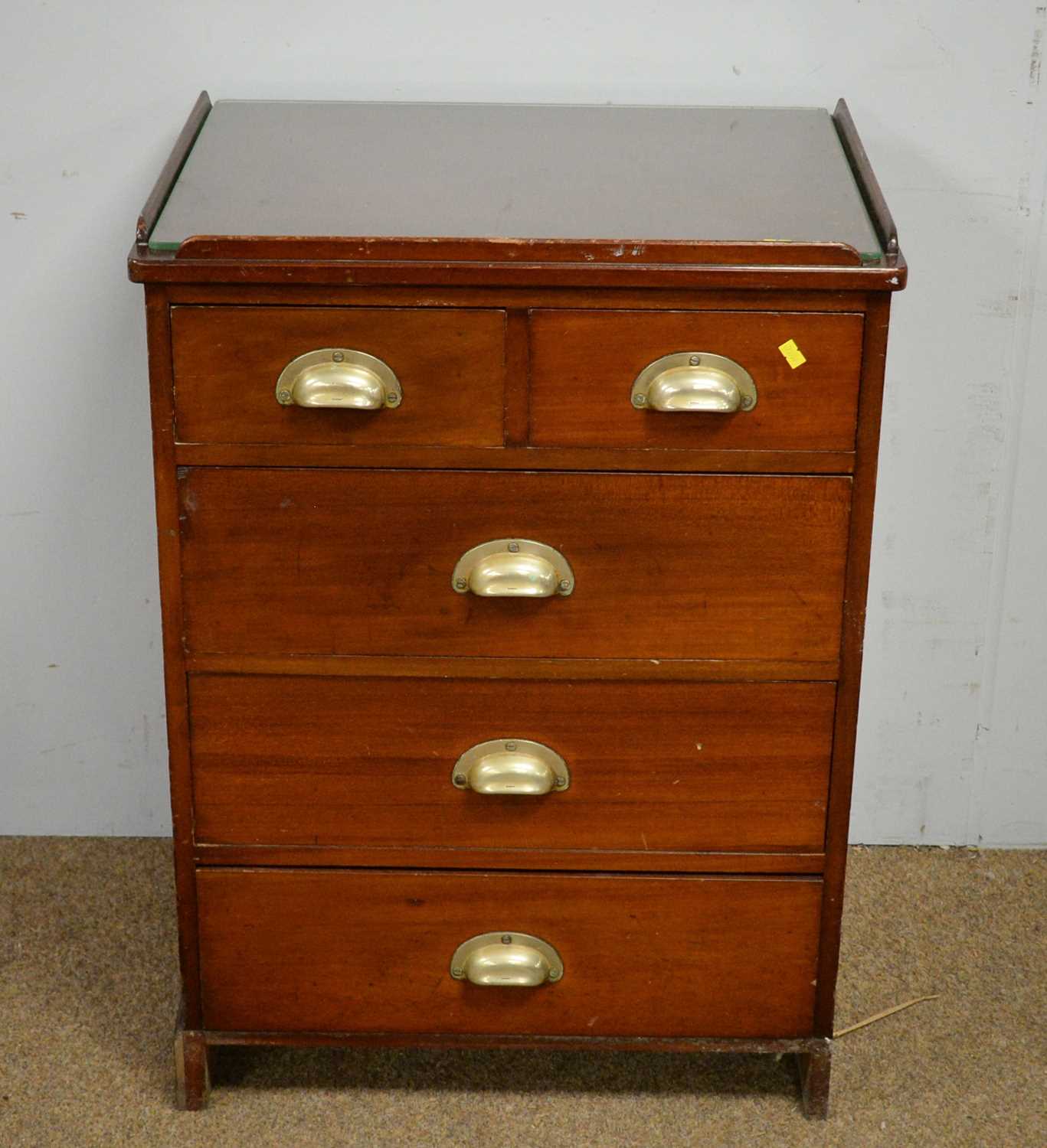 Mahogany chest of drawers with 'patent' handles.