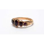 A five stone garnet ring,