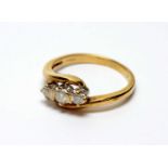 A three stone diamond ring,