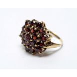 A garnet cluster ring,