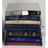 A collection of Folio Society books.