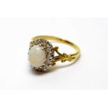 An opal and diamond cluster ring,