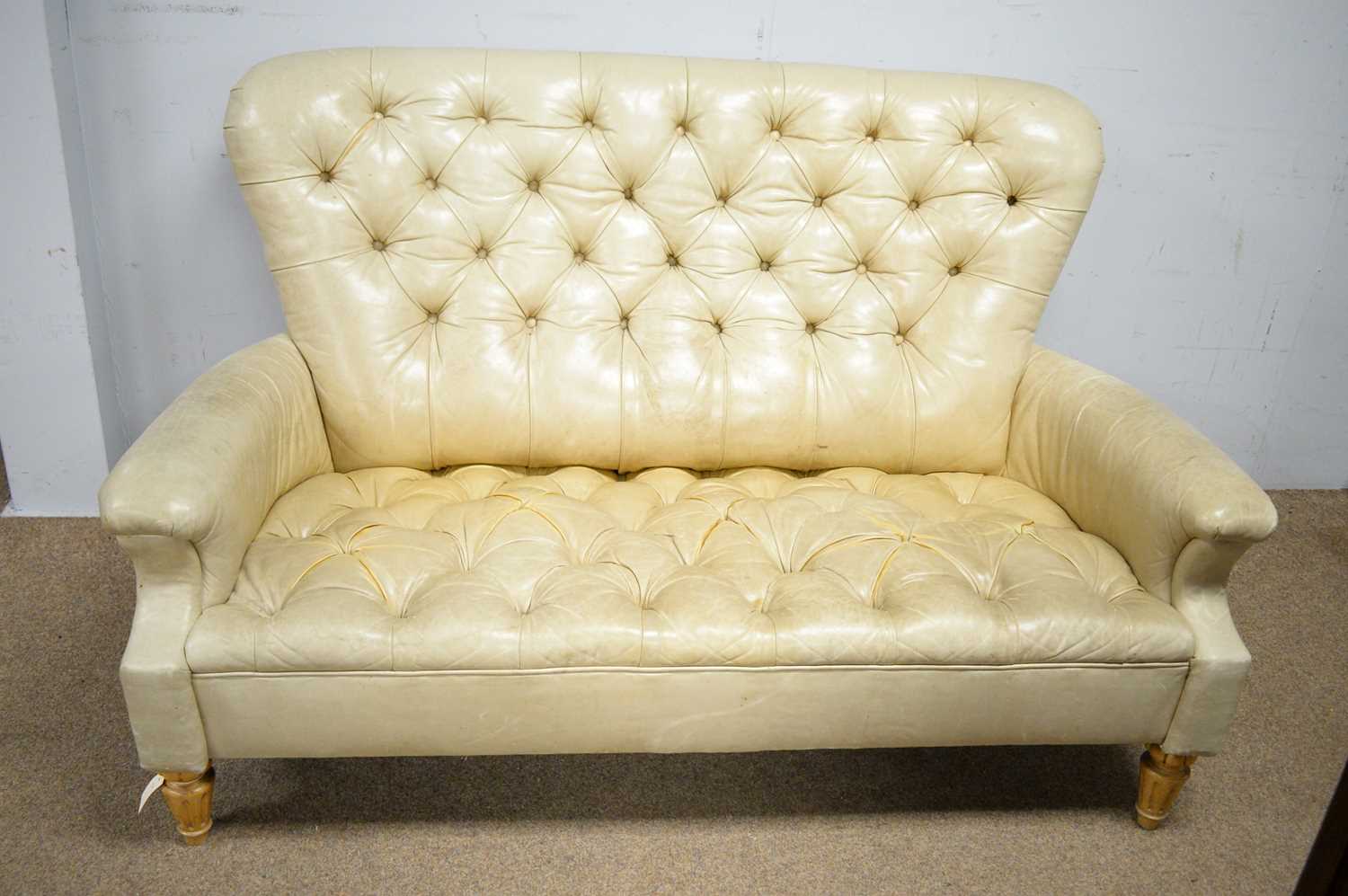 Vanguard Furniture: Chesterfield-style leather upholstered sofa.
