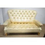 Vanguard Furniture: Chesterfield-style leather upholstered sofa.