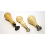 Three 19th Century ivory handled desk seals,