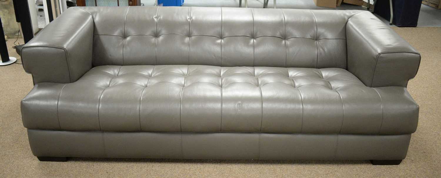 Domicil grey leather three-seater settee.