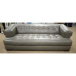 Domicil grey leather three-seater settee.